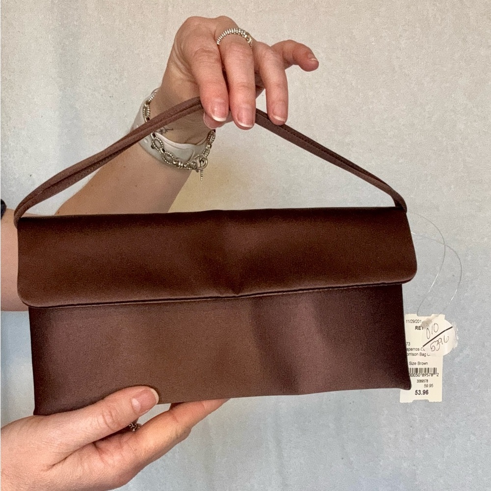 Caparros Brown Leather Clutch with Flap Closure